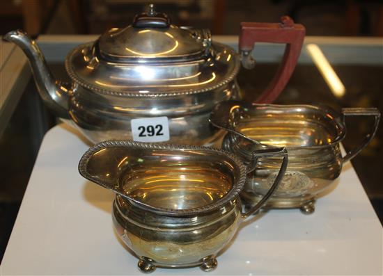 3 piece silver tea set and a silver milk jug